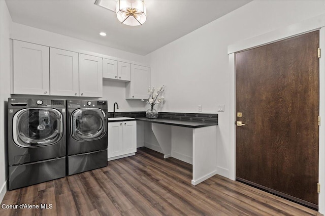 3811 N Foxtail Rd, Post Falls, ID 83854 - laundry room with dark wood-type flooring, separate washer and dryer, recessed lighting, and cabinet space