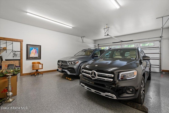 11667 N Eastshore Dr, Hayden, ID 83835 - garage with baseboards