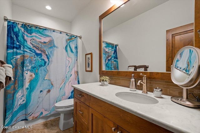 11667 N Eastshore Dr, Hayden, ID 83835 - bathroom with vanity, backsplash, and a shower with curtain
