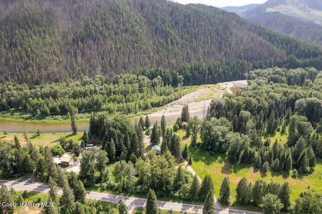 20264 Coeur Dalene River Rd, Kingston, ID 83839 - drone / aerial view of a forest and a mountainous background
