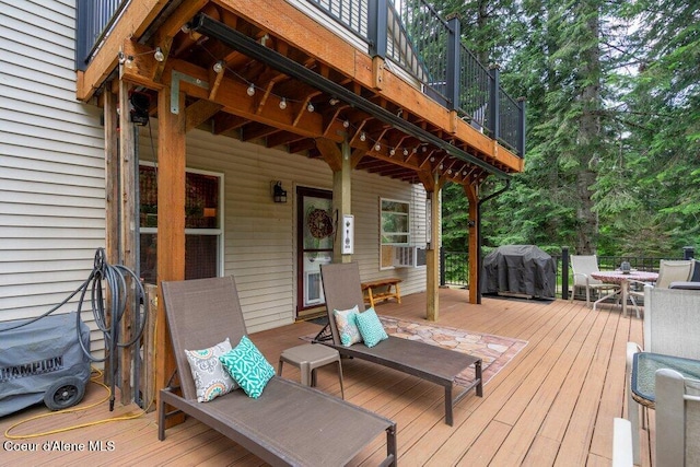 20264 Coeur Dalene River Rd, Kingston, ID 83839 - deck featuring grilling area and outdoor dining area