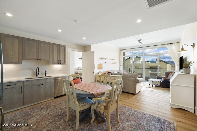 201 N 1st St # 1006, Coeur Dalene, ID 83814 - dining room featuring light wood-style floors and recessed lighting