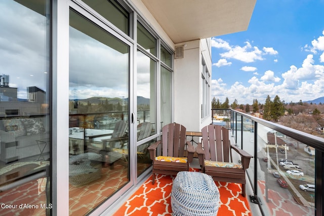 201 N 1st St # 1006, Coeur Dalene, ID 83814 - balcony featuring a mountain view