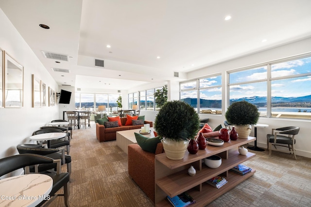 201 N 1st St # 1006, Coeur Dalene, ID 83814 - living area with light colored carpet and recessed lighting
