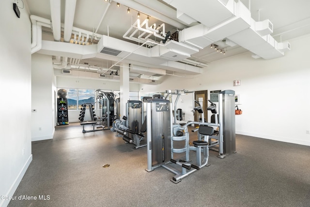 201 N 1st St # 1006, Coeur Dalene, ID 83814 - workout area featuring baseboards