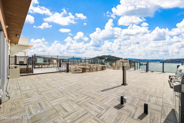 201 N 1st St # 1006, Coeur Dalene, ID 83814 - view of patio featuring a gate