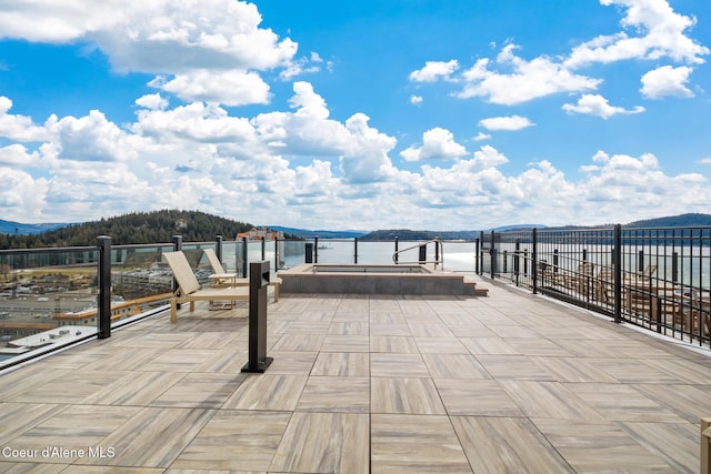 201 N 1st St # 1006, Coeur Dalene, ID 83814 - view of patio featuring a mountain view