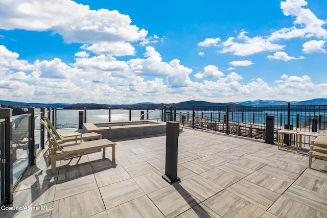 201 N 1st St # 1006, Coeur Dalene, ID 83814 - view of patio / terrace with a mountain view