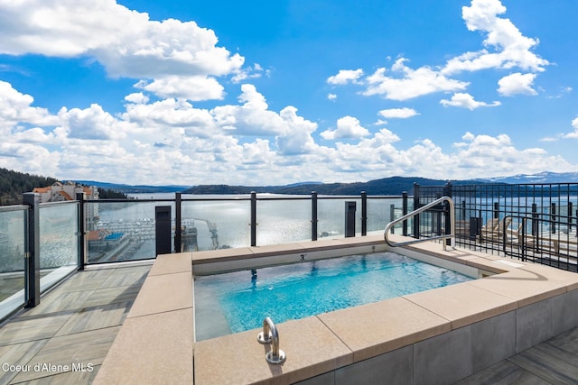 201 N 1st St # 1006, Coeur Dalene, ID 83814 - view of pool featuring a water view