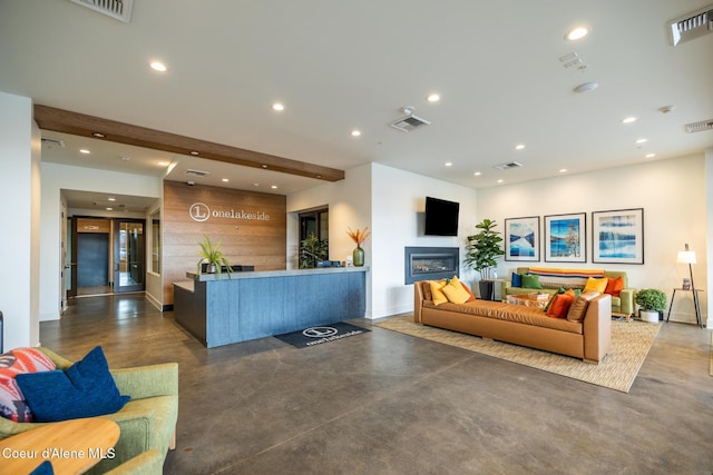 201 N 1st St # 1006, Coeur Dalene, ID 83814 - welcome area featuring recessed lighting and a glass covered fireplace