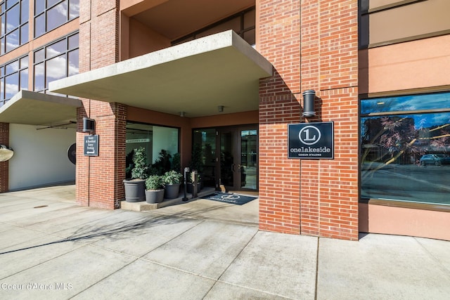 201 N 1st St # 1006, Coeur Dalene, ID 83814 - view of exterior entry featuring brick siding