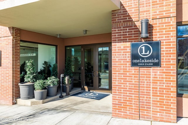 201 N 1st St # 1006, Coeur Dalene, ID 83814 - view of exterior entry with french doors and brick siding