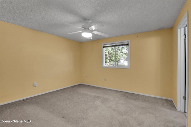 1750 N Havichur Loop, Post Falls, ID 83854 - spare room with carpet floors, a textured ceiling, and a ceiling fan