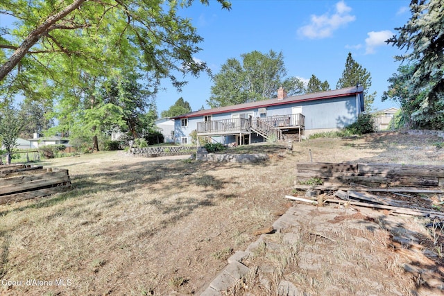 1750 N Havichur Loop, Post Falls, ID 83854 - back of property with stairs and a deck