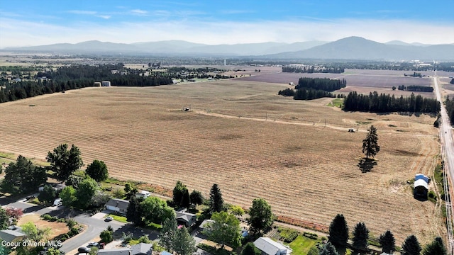 1750 N Havichur Loop, Post Falls, ID 83854 - aerial view of property and surrounding area with mountains and rural landscape