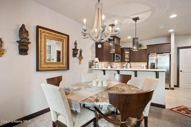 4583 Greenchain Loop Unit 5, Coeur Dalene, ID 83814 - dining space with a chandelier, light carpet, and recessed lighting