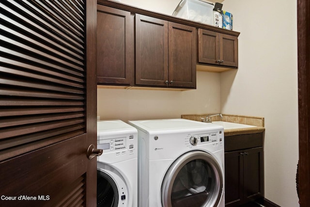 4583 Greenchain Loop Unit 5, Coeur Dalene, ID 83814 - laundry room featuring cabinet space and washer and clothes dryer