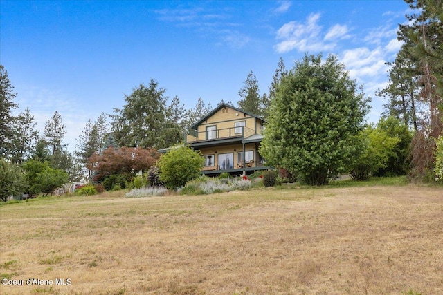 14250 W Sunmeadow Rd, Worley, ID 83876 - view of green lawn featuring a balcony