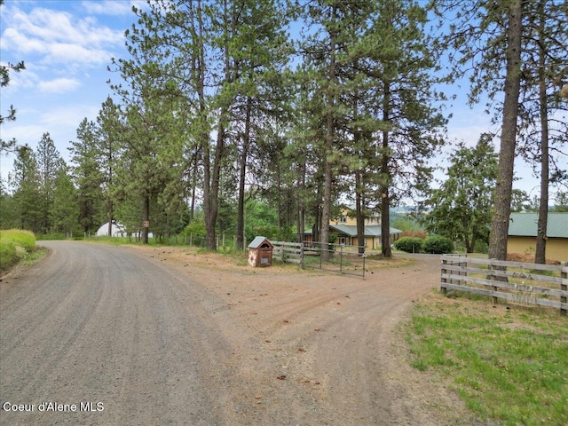 14250 W Sunmeadow Rd, Worley, ID 83876 - view of dirt / gravel driveway featuring a gated entry