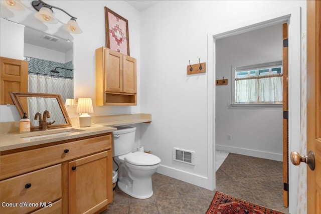 14250 W Sunmeadow Rd, Worley, ID 83876 - full bath with vanity, tile patterned floors, and a shower with shower curtain
