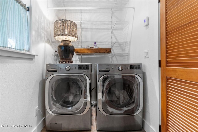 14250 W Sunmeadow Rd, Worley, ID 83876 - laundry area with washing machine and clothes dryer