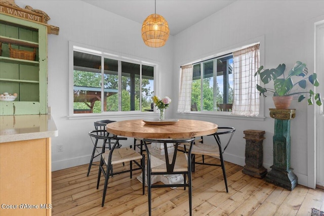 14250 W Sunmeadow Rd, Worley, ID 83876 - dining space featuring hardwood / wood-style flooring and breakfast area