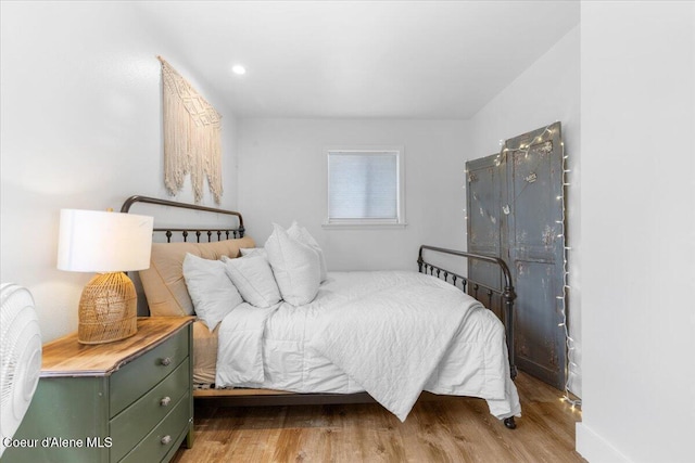 14250 W Sunmeadow Rd, Worley, ID 83876 - bedroom featuring wood finished floors