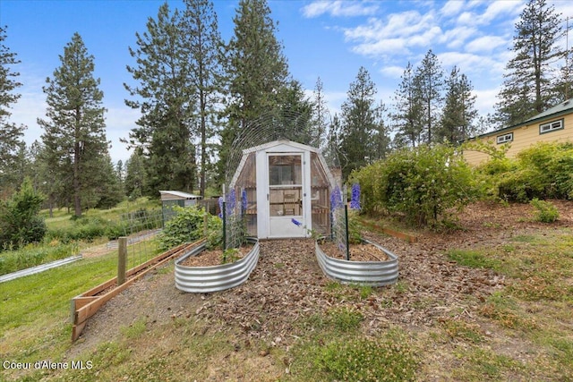 14250 W Sunmeadow Rd, Worley, ID 83876 - view of greenhouse featuring a vegetable garden and a yard