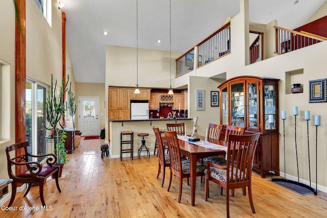 1600 Shepherd Rd, Saint Maries, ID 83861 - dining space featuring high vaulted ceiling and light wood-style floors