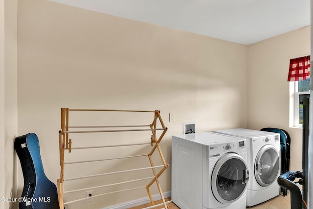 1600 Shepherd Rd, Saint Maries, ID 83861 - washroom featuring washer and dryer and light tile patterned flooring
