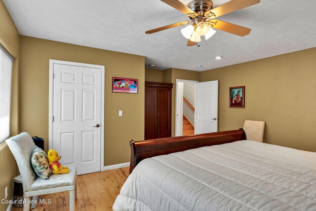 1600 Shepherd Rd, Saint Maries, ID 83861 - bedroom with light wood-style floors and a ceiling fan