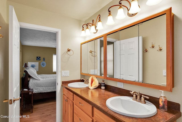 1600 Shepherd Rd, Saint Maries, ID 83861 - ensuite bathroom featuring double vanity and wood finished floors