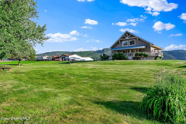 1600 Shepherd Rd, Saint Maries, ID 83861 - back of house with a yard and covered porch