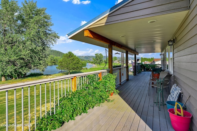 1600 Shepherd Rd, Saint Maries, ID 83861 - wooden deck with a yard and a water view