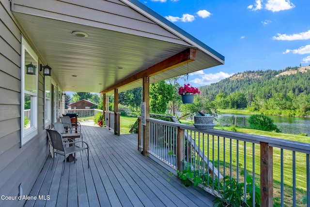 1600 Shepherd Rd, Saint Maries, ID 83861 - deck featuring a water and mountain view and a yard