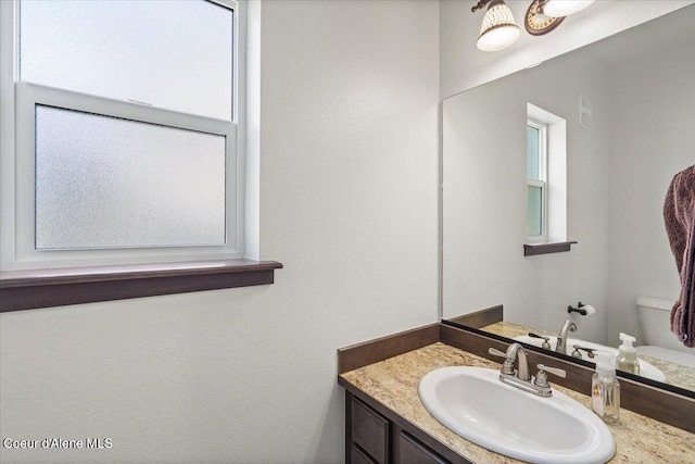1824 E Warbler Ln, Post Falls, ID 83854 - bathroom with vanity and toilet