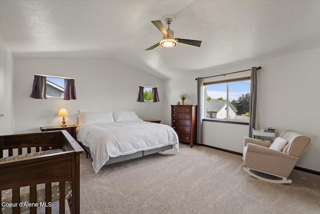1824 E Warbler Ln, Post Falls, ID 83854 - bedroom featuring carpet flooring, vaulted ceiling, and ceiling fan