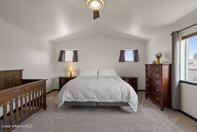 1824 E Warbler Ln, Post Falls, ID 83854 - bedroom featuring lofted ceiling and light colored carpet