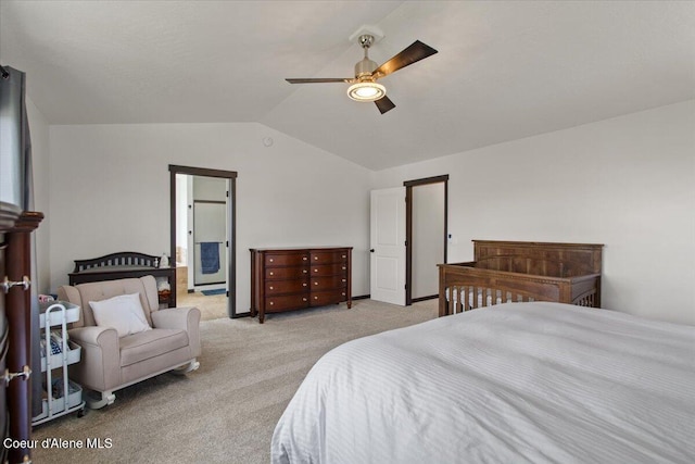 1824 E Warbler Ln, Post Falls, ID 83854 - bedroom featuring vaulted ceiling, light carpet, a ceiling fan, and connected bathroom