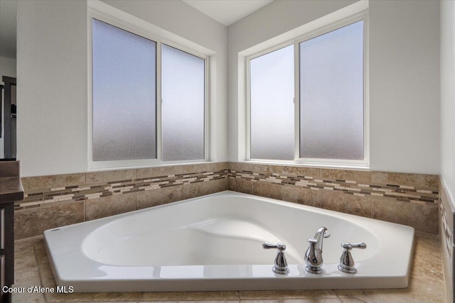 1824 E Warbler Ln, Post Falls, ID 83854 - bathroom with healthy amount of natural light and a bath