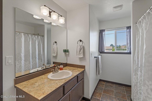 1824 E Warbler Ln, Post Falls, ID 83854 - bathroom with vanity and stone finish floors