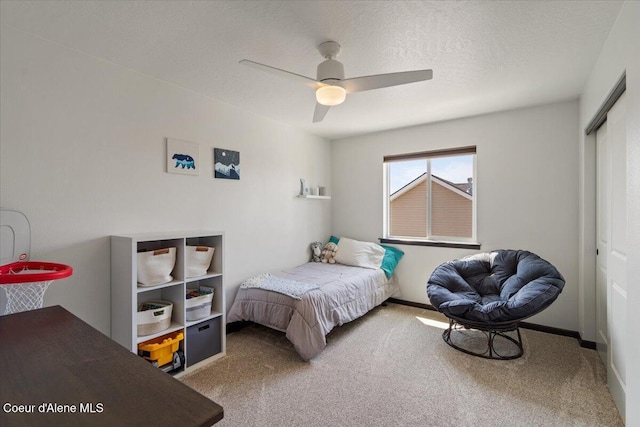 1824 E Warbler Ln, Post Falls, ID 83854 - carpeted bedroom featuring a closet and ceiling fan