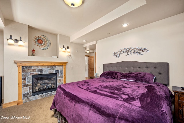 653 Dover Bay Pkwy Unit 101, Dover, ID 83825 - bedroom featuring carpet flooring, a stone fireplace, and recessed lighting