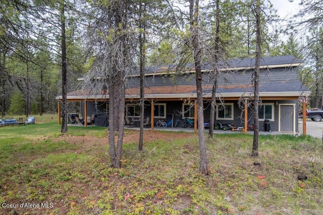 172 Wyatt Ln, Spirit Lake, ID 83869 - back of property