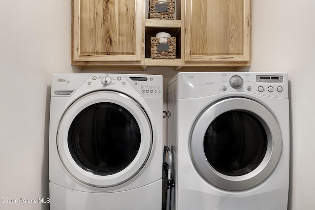 81 Mango St, Moyie Springs, ID 83845 - laundry room with washing machine and dryer and cabinet space