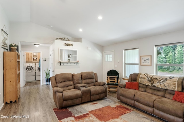 81 Mango St, Moyie Springs, ID 83845 - living area with washing machine and clothes dryer, light wood-style flooring, lofted ceiling, and recessed lighting