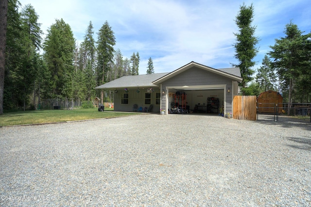 81 Mango St, Moyie Springs, ID 83845 - ranch-style home featuring a gate, driveway, and an attached garage