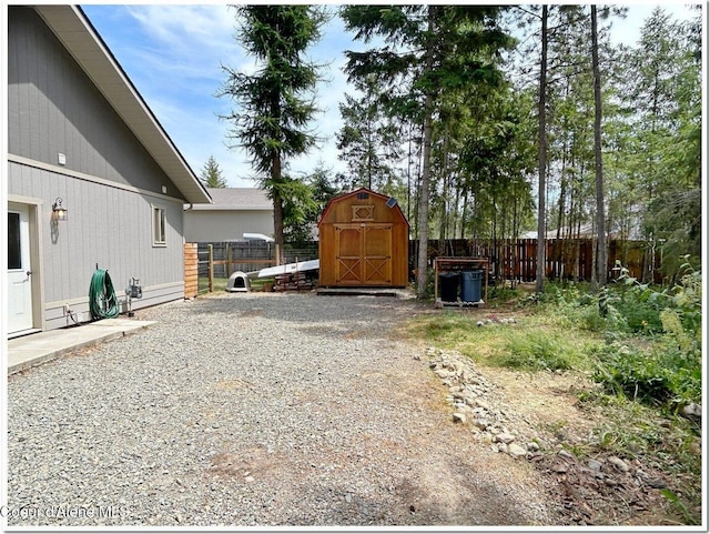 81 Mango St, Moyie Springs, ID 83845 - fenced backyard with a storage unit