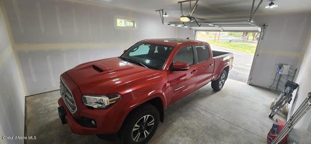 817 6th St, Kamiah, ID 83536 - garage with a garage door opener