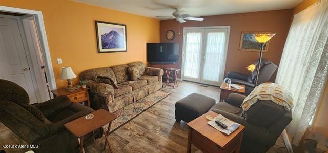 817 6th St, Kamiah, ID 83536 - living room with wood finished floors and a ceiling fan